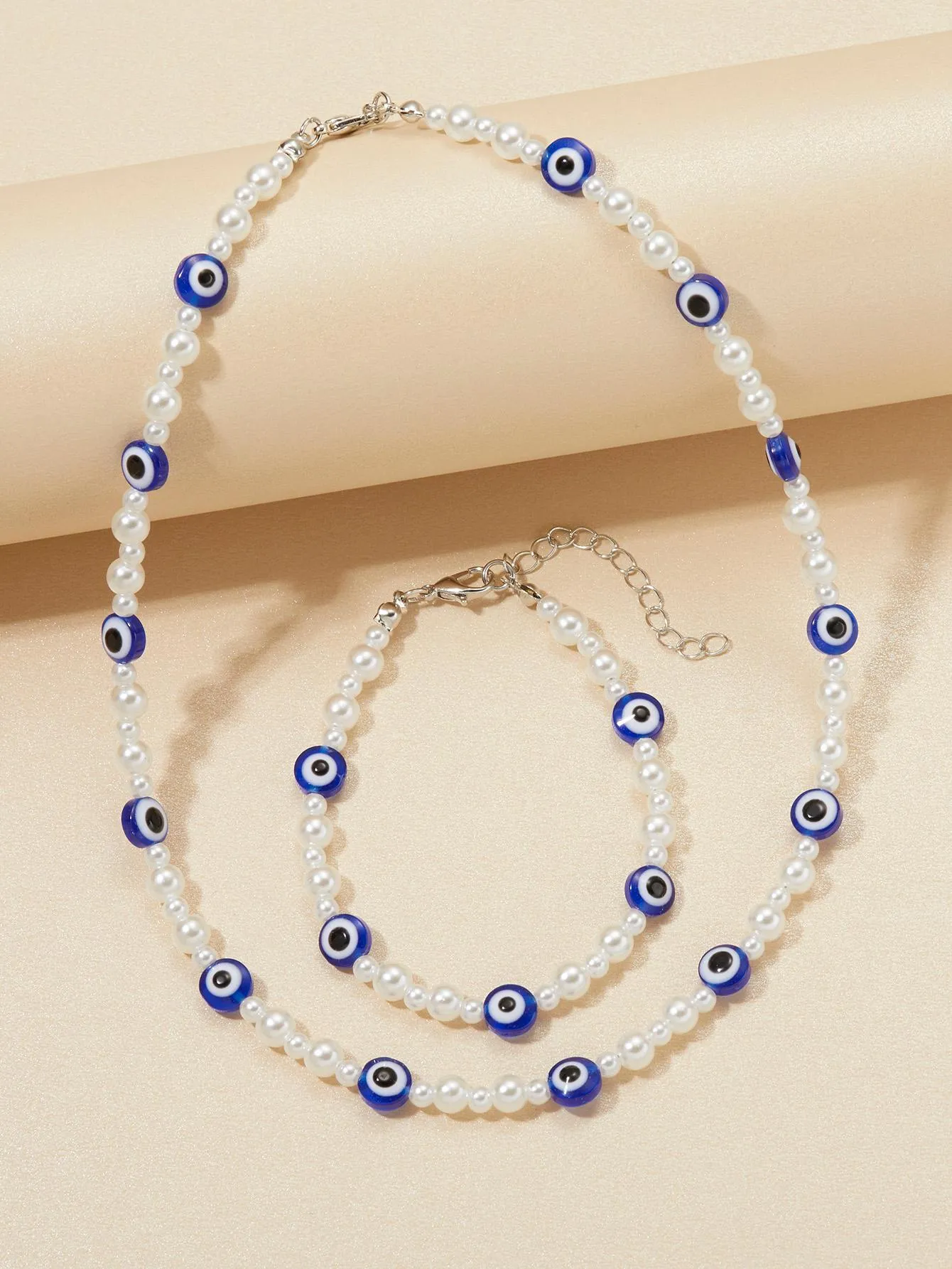 10032 1b-058 Collar con diseño de ojo con cuenta con perla artificial con pulsera