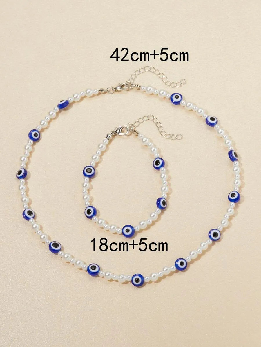 10032 1b-058 Collar con diseño de ojo con cuenta con perla artificial con pulsera